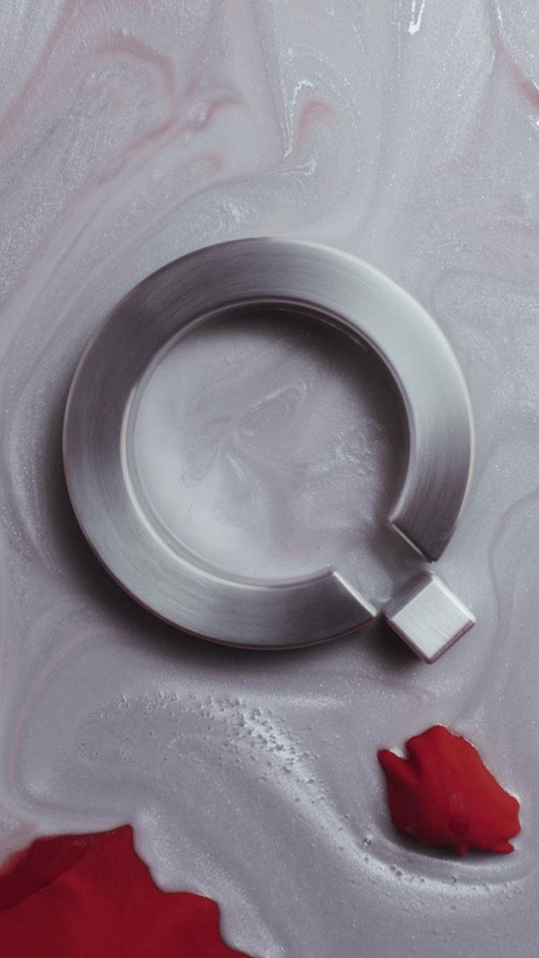 En stor Q som illustrerer IONIQ merket. Illustrasjon.