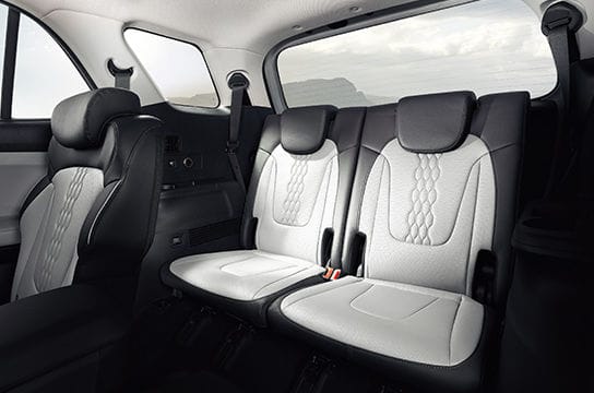 2nd row seat folding system with 3rd row seats