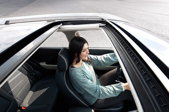 Power tilt-and-slide sunroof