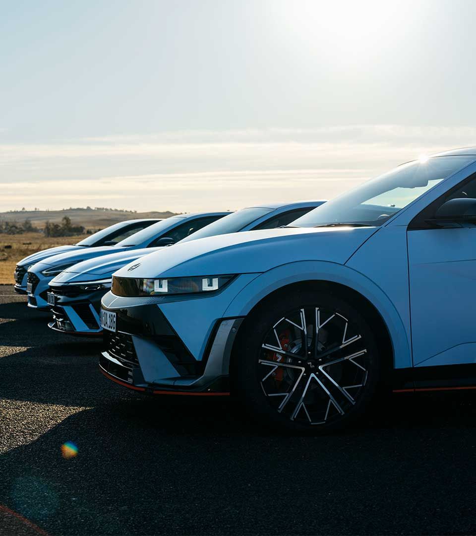 Hyundai N Range lined up in a serene background.
