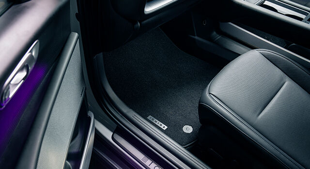 Tailored carpet floor mats.