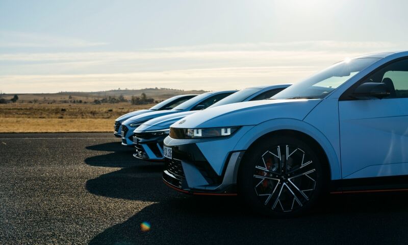 Hyundai N cars lined up against with a dry desert backdrop