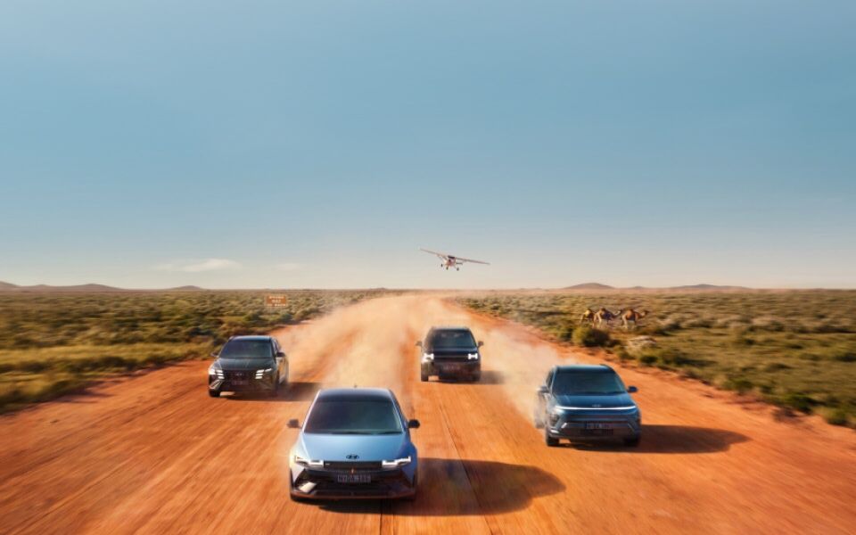 Hyundai N cars on the road against a desert backdrop