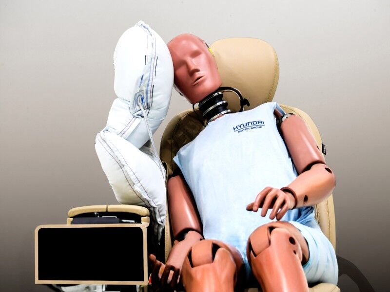 Front view of crash test dummy after side airbag deployed