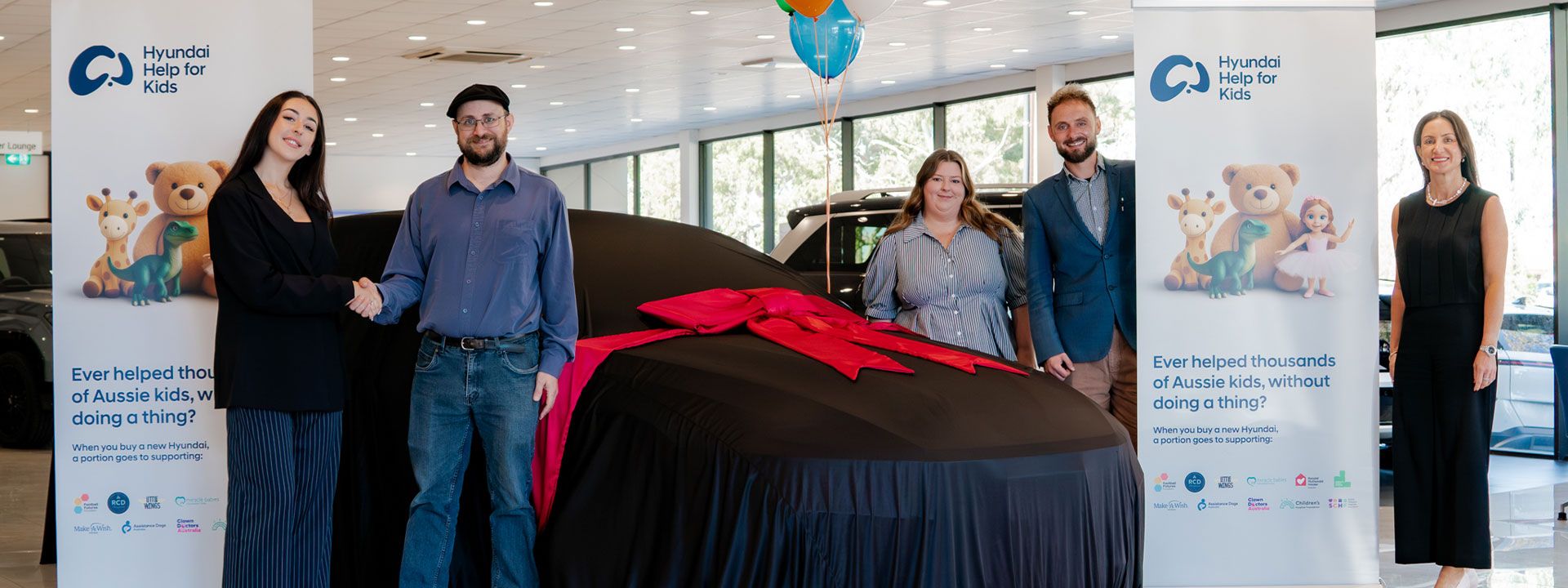 Hyundai Help for Kids celebrates a major milestone, supporting Aussie children as a new vehicle is unveiled with customers and team members.