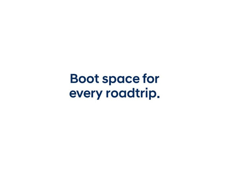 Minimalist image with the text "Boot space for every roadtrip." centered on a white background, promoting ample cargo capacity in Hyundai vehicles, ideal for travel and adventure.