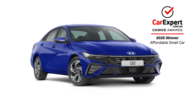 Hyundai i30 Sedan with on a white background with a car expert award logo.