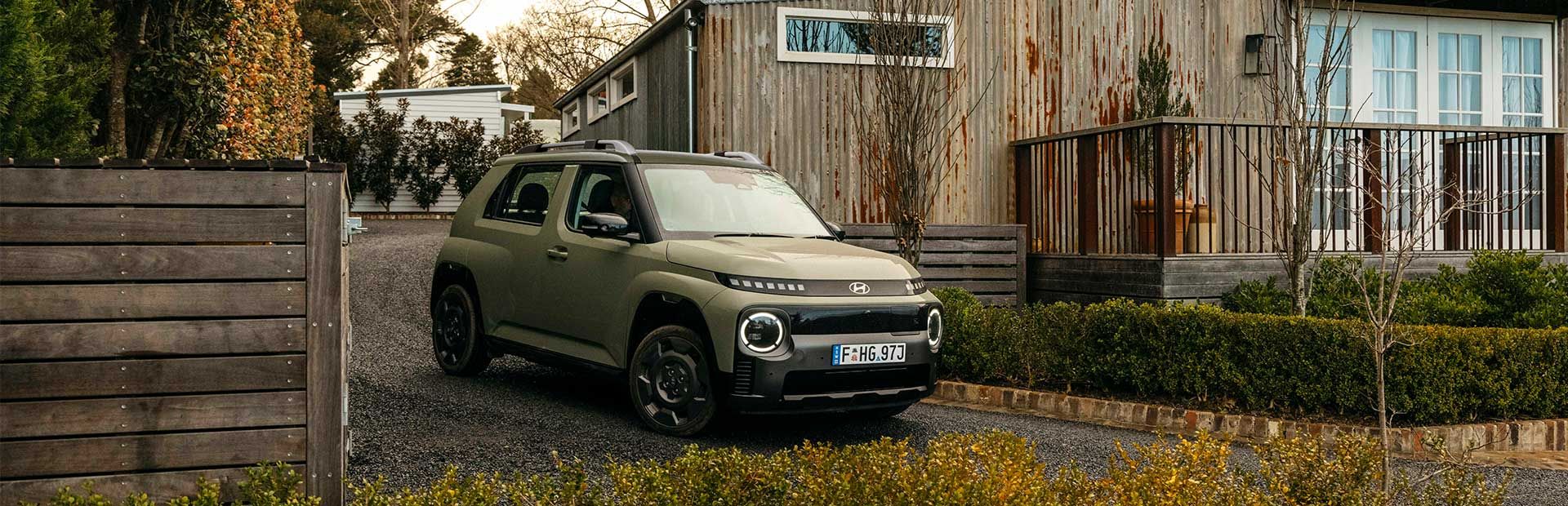 Explore the Hyundai INSTER in khaki green, featuring a rugged SUV-inspired exterior, signature LED lighting and a compact design built for modern urban driving.