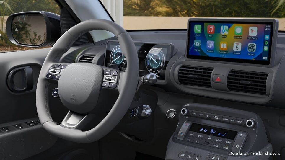 INSTER_Cross_Interior_Hotspots_Apple_carplay_965x542_02.jpg