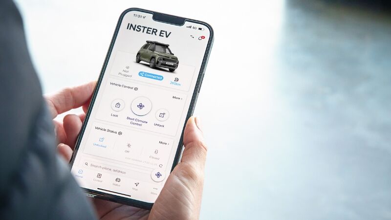 Person viewing Inster EV Bluelink Mobile App on a mobile phone