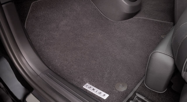 Tailored carpet floor mats.