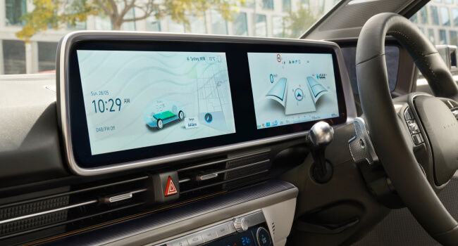 Integrated cluster and infotainment display.
