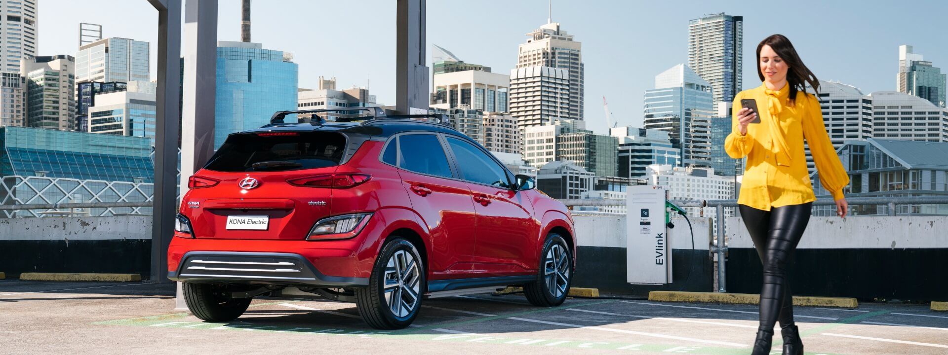 Hyundai_Accessories_KonaEV_ROOFTOP_HERO_CHARGE_TALENT_V1_1920x720.jpg