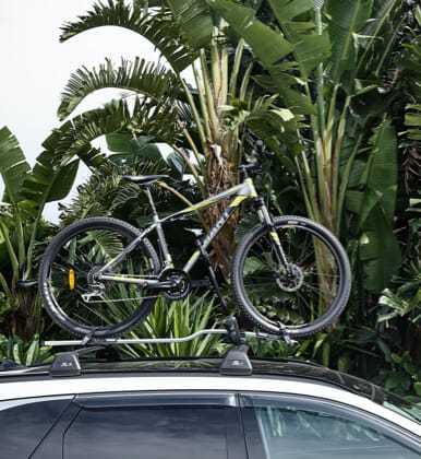 Hyundai_Tucson_NX4_Accessories_Bike_Carrier_Wheel_On_3_386x420.jpg