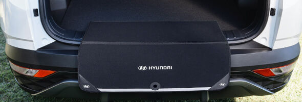 Hyundai_Tucson_Accessories_NX4_Fabric-Rear-Bumper-Protector-2_590x200.jpg