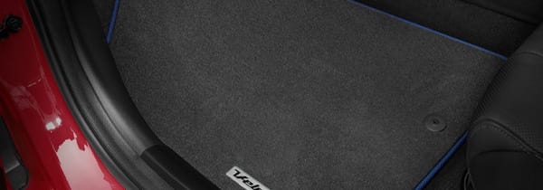 Hyundai_Veloster_accessories_FloorMatsBlueStitch_igniteflame_600x210.jpg