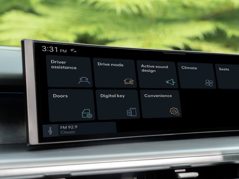 Close-up of the Hyundai IONIQ 9’s touchscreen display showcasing various vehicle settings, including Driver Assistance, Drive Mode, Climate, and Digital Key, reflecting the car's advanced digital interface and smart features.