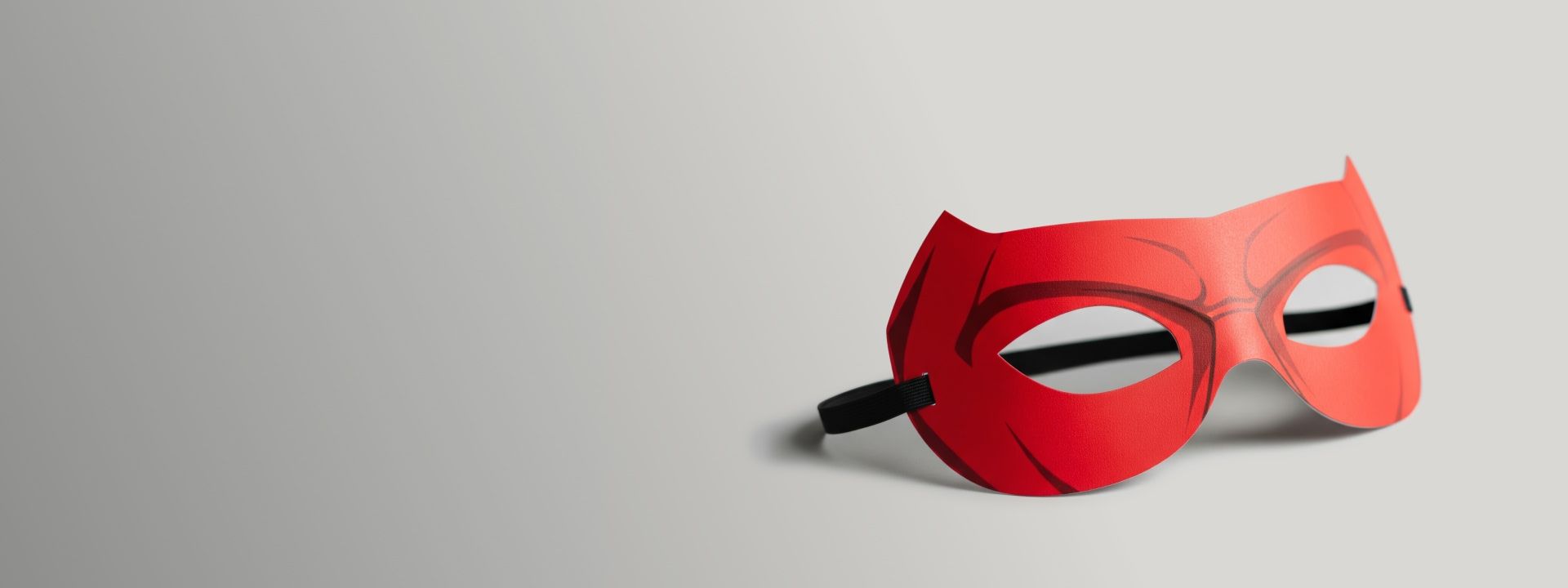 Bold red superhero mask symbolizing hope and transformation, featured in Hyundai Help for Kids’ partnership with Make-A-Wish Australia,empowering children through life-changing experiences.
