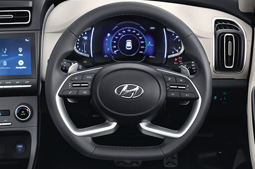Driver seat height adjust