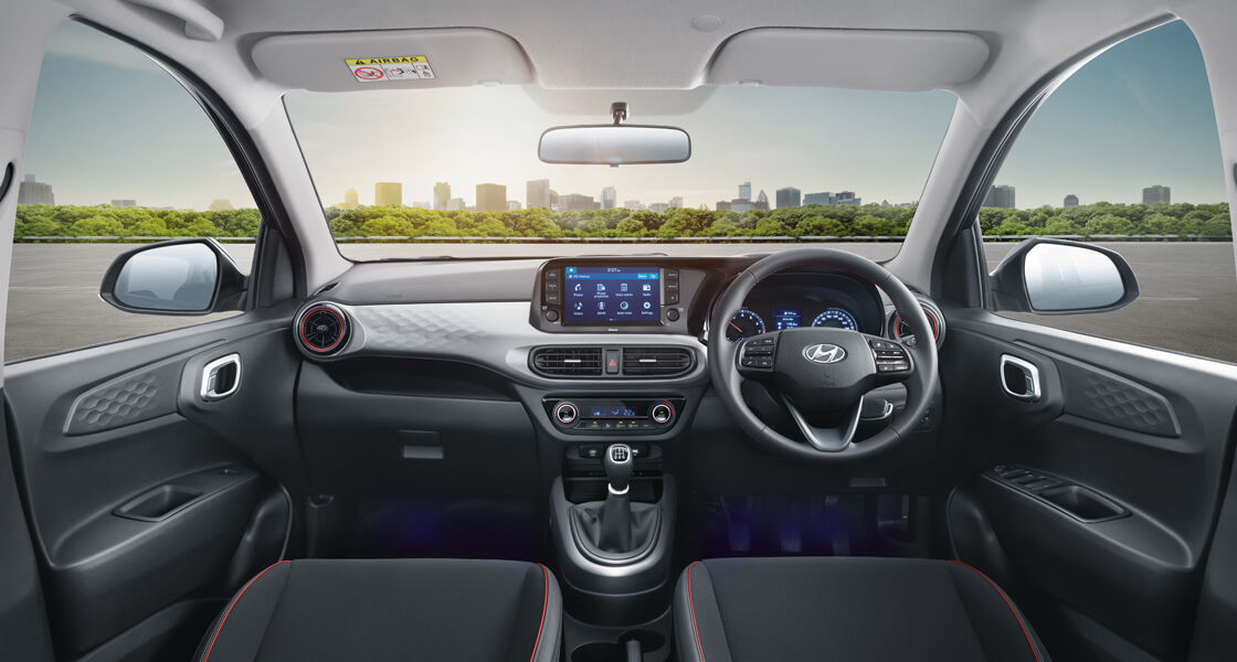 Sporty Black Interiors with Red Inserts