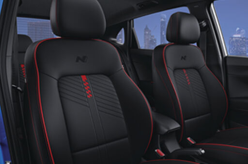 Chequered flag design leather* seats with N logo