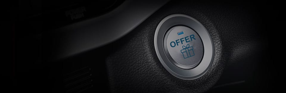 A car is driving on the road.