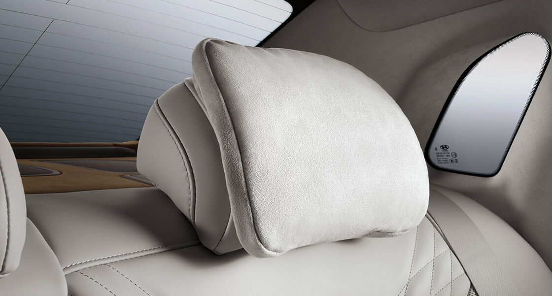 Suede neck pillow for rear seats