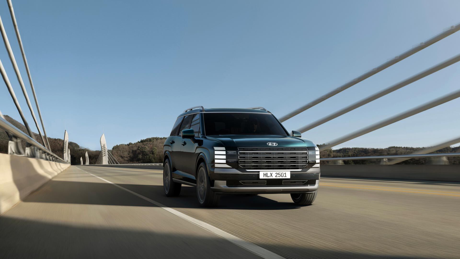 The all-new PALISADE driving on the road