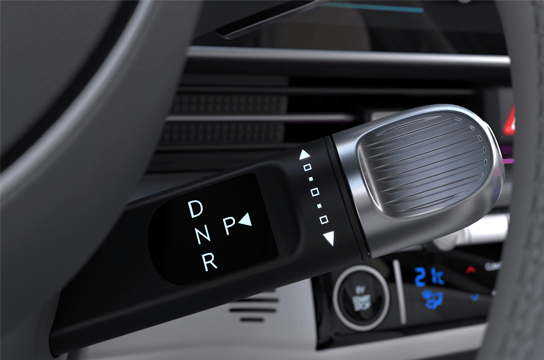 Transmission à commande électrique derrière le volant.