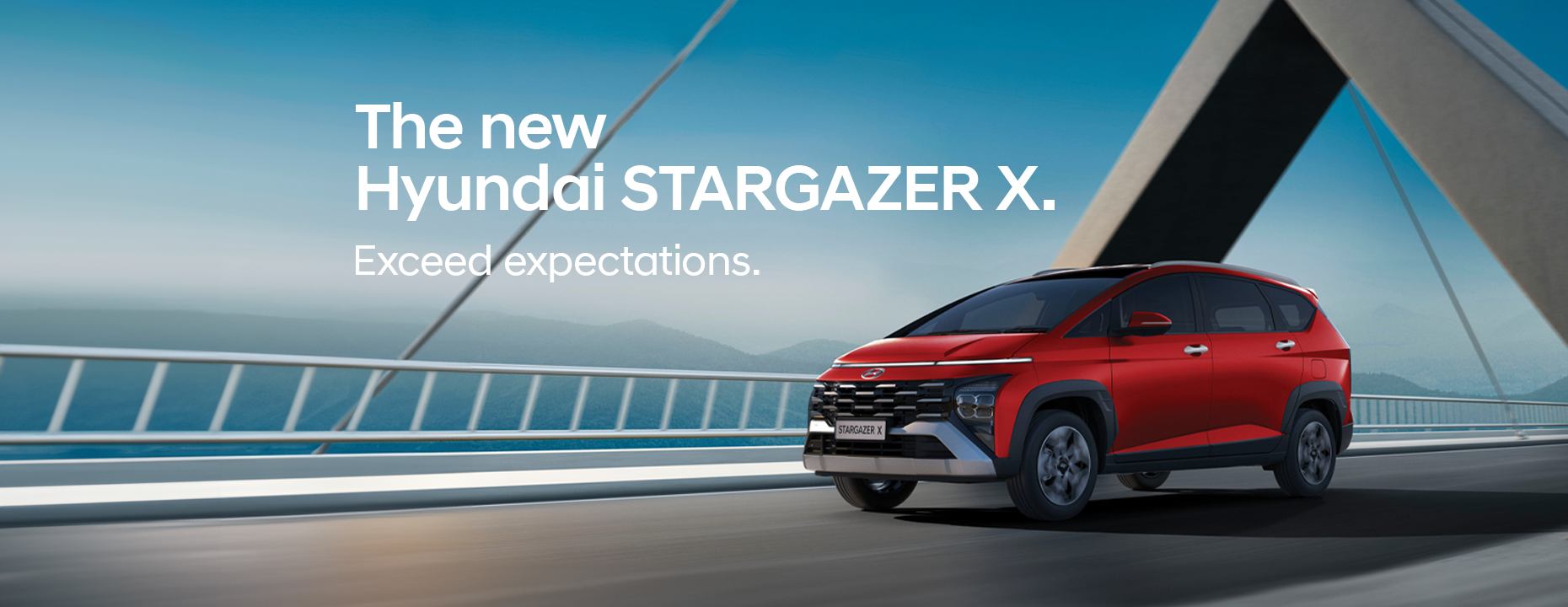 Moving shot of the Hyundai STARGAZER X on a bridge