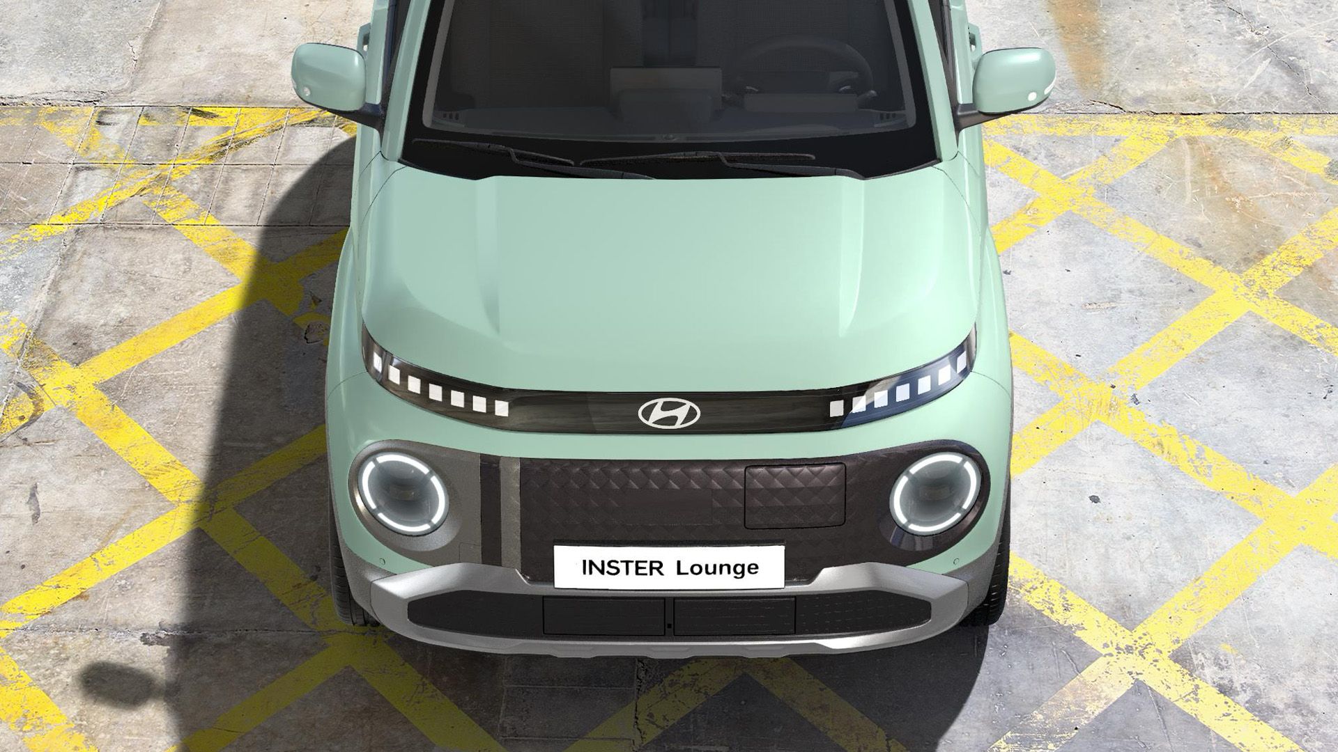 Close-up front exterior view of Hyundai INSTER Lounge in Glow Mint.