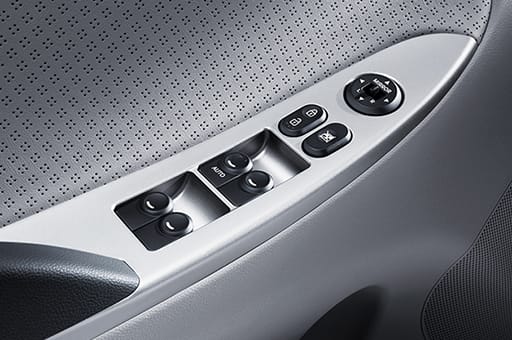 Power window adjustment controls on the armrest area