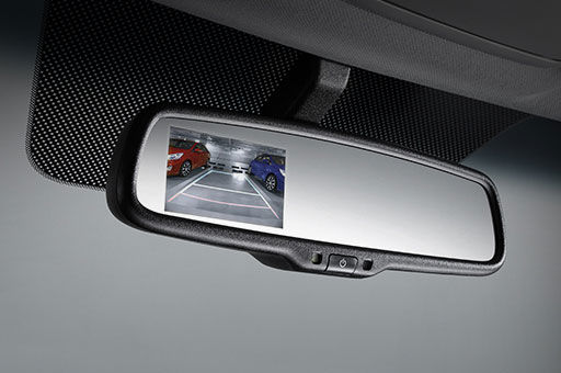 Rear camera display system on the rear view mirror