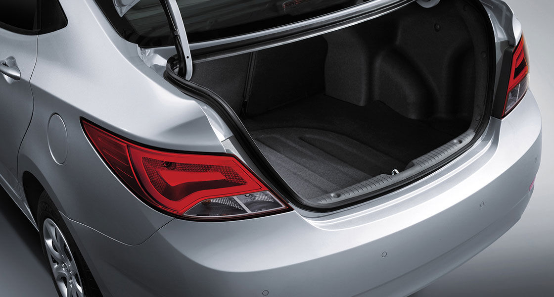 Rear view of silver Accent with trunk opened