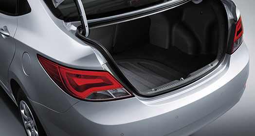 Rear view of silver Accent with trunk opened