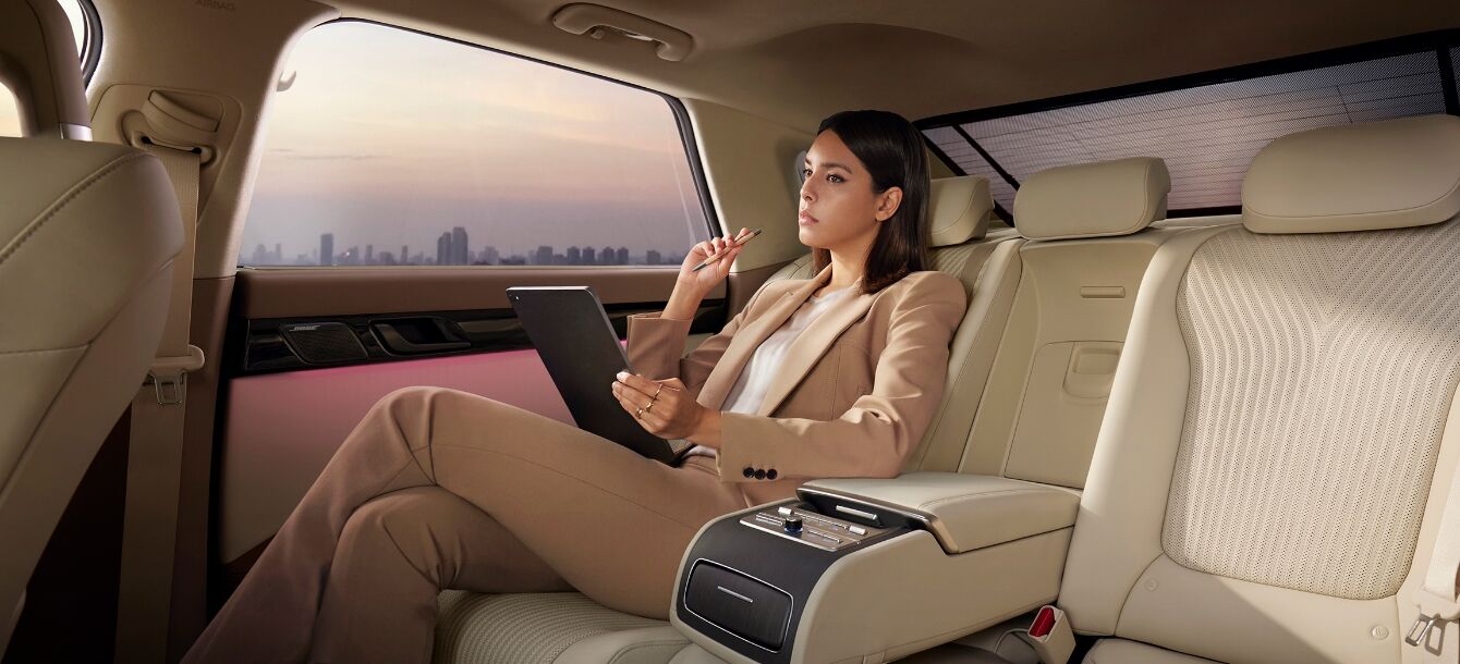 A woman is working on a laptop in the AZERA