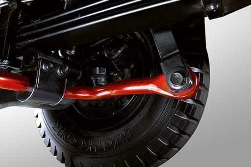 Red metal bars mounted to chassis