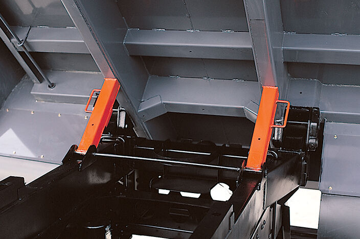 safety stopper mounted to dumping cargo