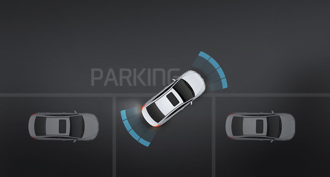 Top view of white Elantra parking with assist system
