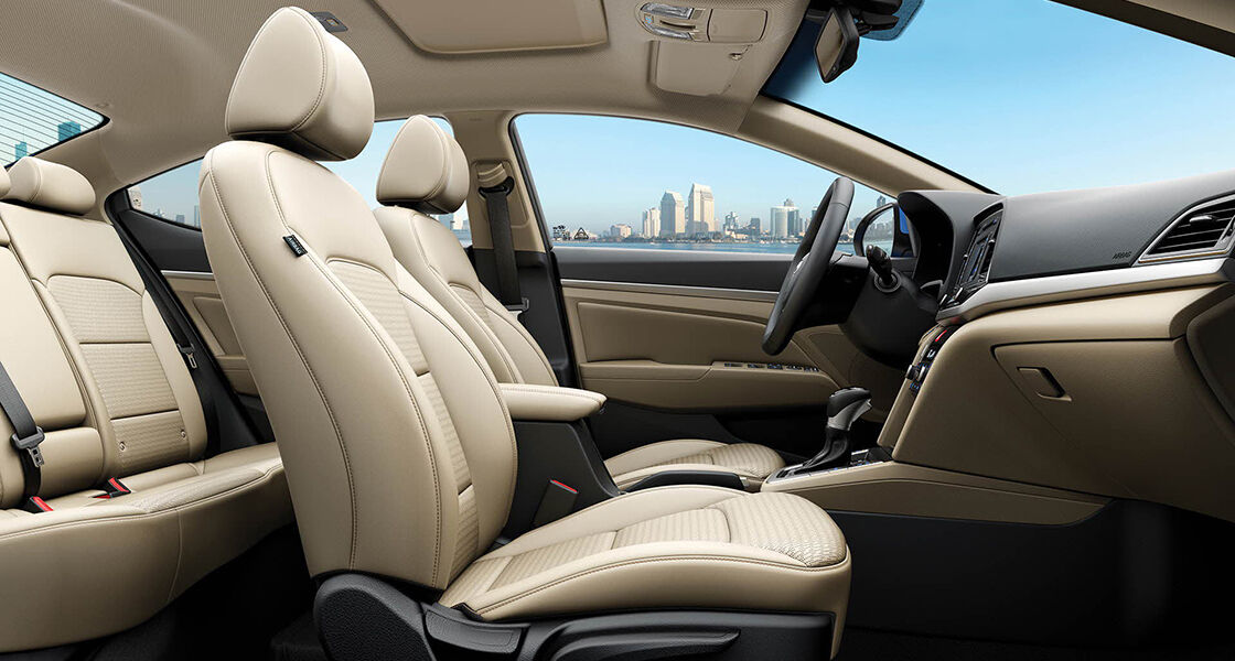 Beige color interior view of front seats from passenger's viewpoint