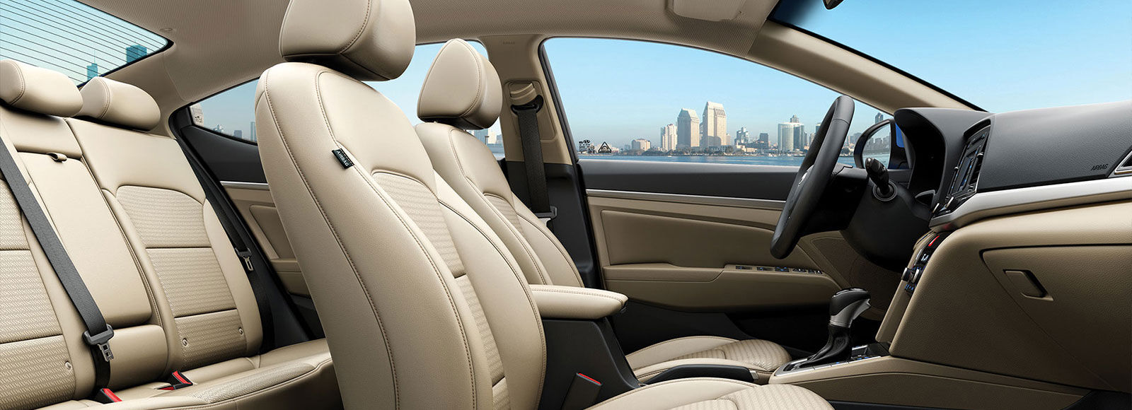 Beige color interior view of front seats from passenger's viewpoint