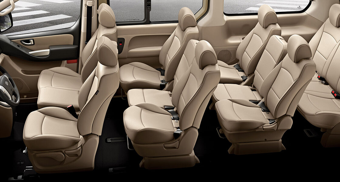 Eight beige seats inside H-1