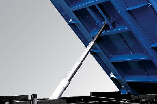 Close-up photo of a multi-level cylinder lifting the dump bed