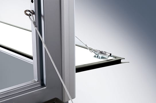 Photo of the side and rear gates of the storage space open and secured with a line to a hook