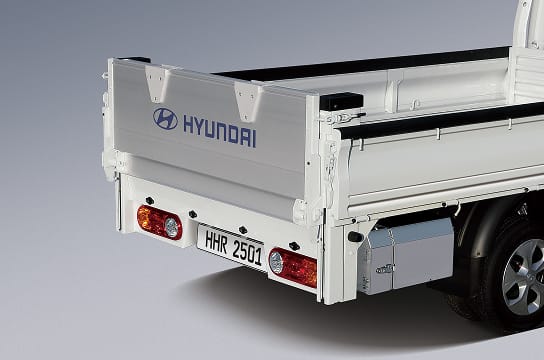 Rear studio photo of a folded aluminum rear tailgate