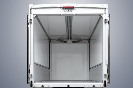Photo showing the entire storage space visible through the open rear door of the vehicle