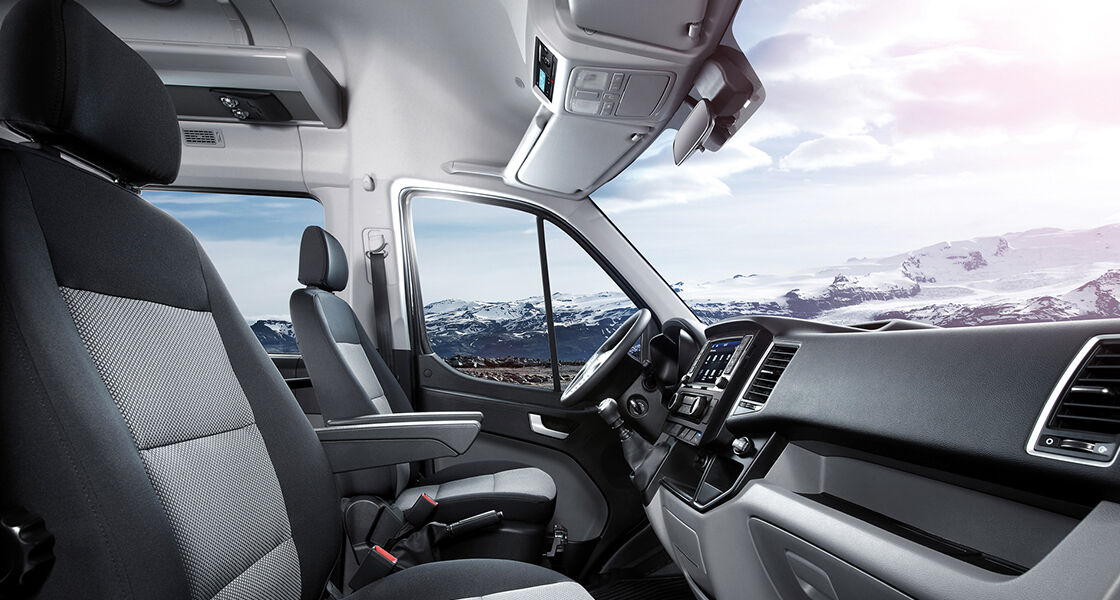 Panoramic view of front seat interior from passenger seat