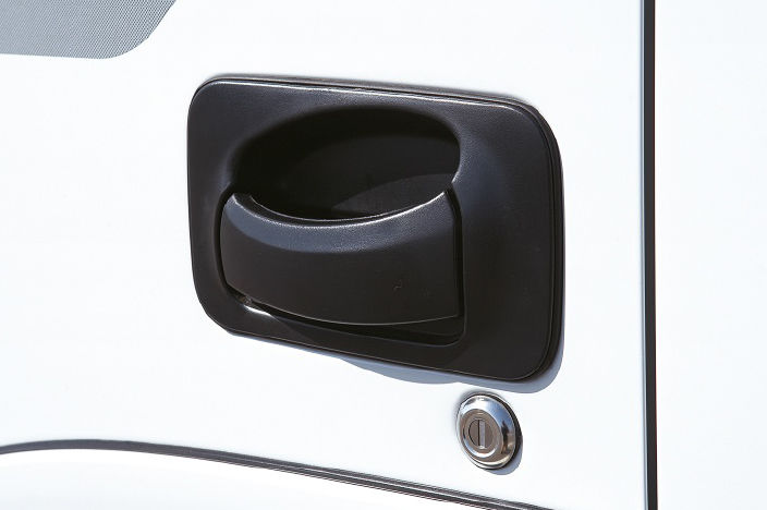 image focused on black door handle