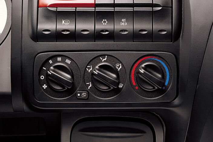 front image of air control system with several buttons and dials