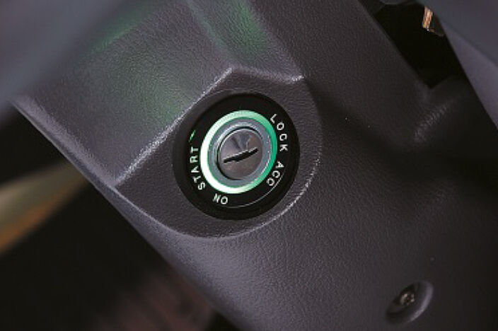keyhole with green lamp on